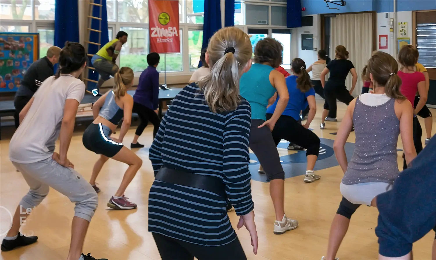 Certified Zumba instructor leading a group of people 50 plus in a Zumba class for 50+ in Ottawa