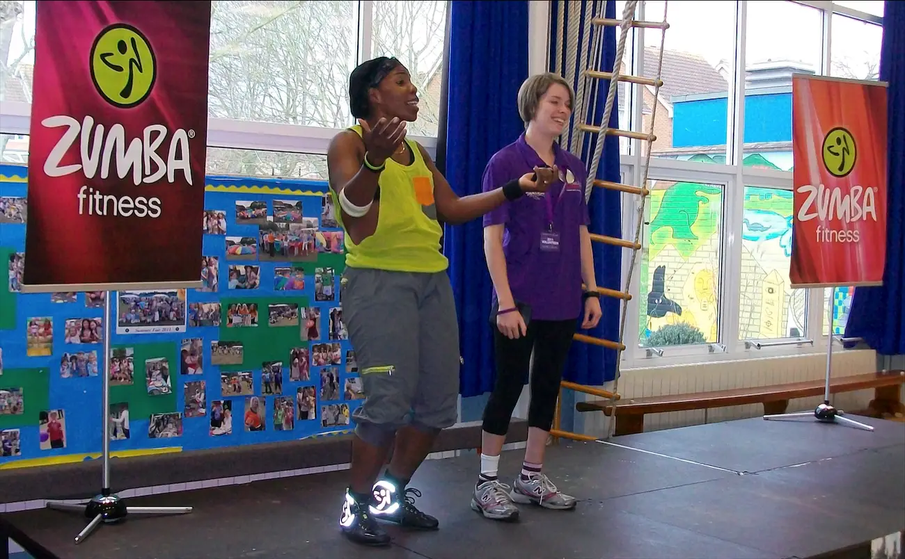 Certified instructor teaching a Zumba class for 50+ in Ottawa to a group of people 50 plus